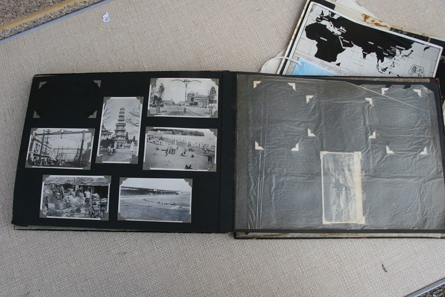 A 1930's black lacquer photograph album containing Japanese and Chinese black and white - Image 25 of 27