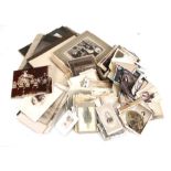 A quantity of assorted monochrome Edwardian and later photographs, the majority portraits.