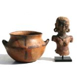 An early fragmentary pottery female figure on stand, 21.5cms (6.5ins) high; together with a two-