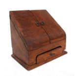 A hardwood stationery box, 31cms (12.25ins) wide.