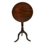 A George III fruitwood tilt-top tripod table, 50cms (19.75ins) diameter.