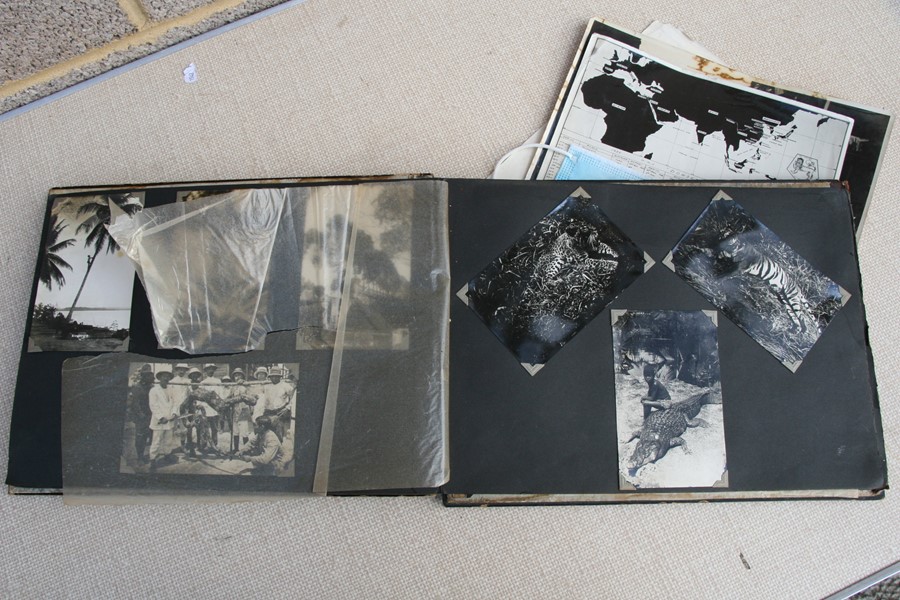 A 1930's black lacquer photograph album containing Japanese and Chinese black and white - Image 22 of 27