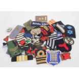 Approximately One Hundred (100) assorted mainly Military cloth badges