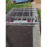 A Land Rover 90 roof rack, ladder and lighting board