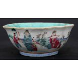 A Chinese famille rose bowl decorated with figures, red seal mark to the underside, 15cms (6ins)