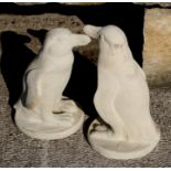 A pair of reconstituted stone penguins, each 50cms (20ins) high (2).