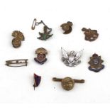 Ten assorted Military sweetheart brooches and lapel badges including Army Service Corps, Royal