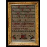 A 19th century sampler, with alphabet, verse, birds and a red house in a maple frame. 20 by 30cm ( 8