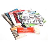 Assorted Japanese motorcycle sales brochures and workshop manuals, including Honda CX 500, Yamaha DT