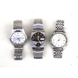Three gentleman's vintage Seiko stainless steel wristwatches.