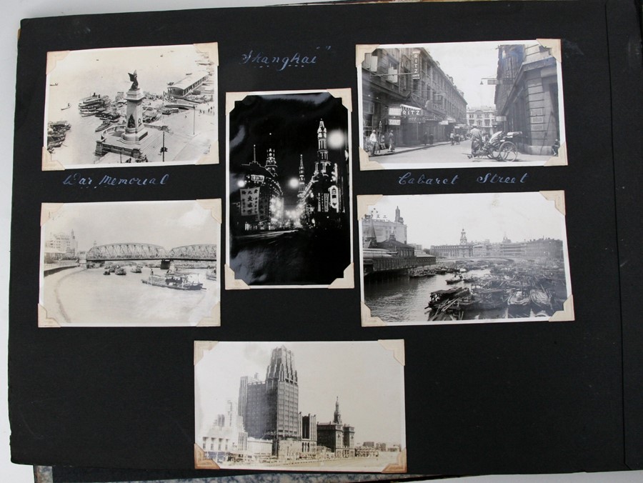 A 1930's black lacquer photograph album containing Japanese and Chinese black and white - Image 3 of 27