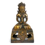 A Chinese bronze figure of a seated Buddha in meditation, 16cms (6.25ins) high.
