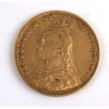 An 1888 full gold sovereign.