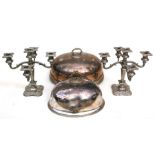 Two silver plated meat domes, the largest 36cms (14ins) wide; together with a pair of silver