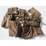 A quantity of ladies tweed trousers and plus fours.