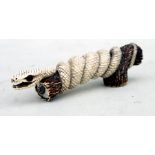 A finely carved ivory faux antler walking stick handle in the form of a snake entwined around a