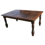An oak rectangular dining table on turned legs with parquetry style top, 178 by 118cms (70 by