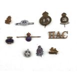 Ten assorted Military sweetheart brooches and lapel badges including the Merchant Navy, Berkshire