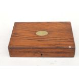 An oak gun case with sectioned baize interior, 31cms (12.25ins) wide.