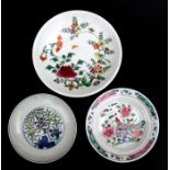 A Chinese famille rose shallow dish decorated with birds and flowers, 20cms (8ins) diameter;