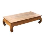 A Chinese hardwood low table, 142cms (56ins) wide.