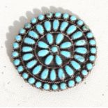 A Native American Navajo turquoise and silver pendant brooch, impressed Sterling PB and a