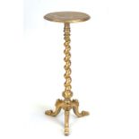 A Victorian plant stand on barleytwist turned column and tripod base, later painted gold.