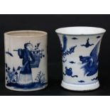 A Chinese blue & white brush pot of flared cylindrical form decorated with a phoenix amongst clouds,