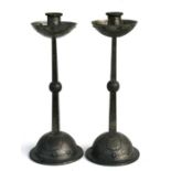 A pair of WMF Arts & Crafts candlesticks, 27cms (10.5ins) high.