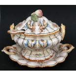 A large Capodimonte soup tureen and cover with ladle on stand, 46cms (18ins) wide.