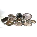 A quantity of silver plated items to include tea sets, trays and an Alessi Italian design plate.