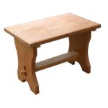 A Cotswold school style oak stool, 61cms (24ins) wide.