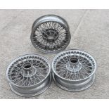 Three chrome 38cms (15ins) diameter chrome wire wheels, believed to be for a MG (3).