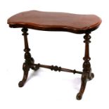 A 19th century mahogany side table on turned supports joined by a pole stretcher, 91.5cms (36ins)