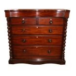 A victorian mahogany chest with two short and three graduated long drawers on a plinth base.