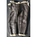 A pair of WWII RAF / USAF Bomber Command sheepskin cold weather trousers with braces.