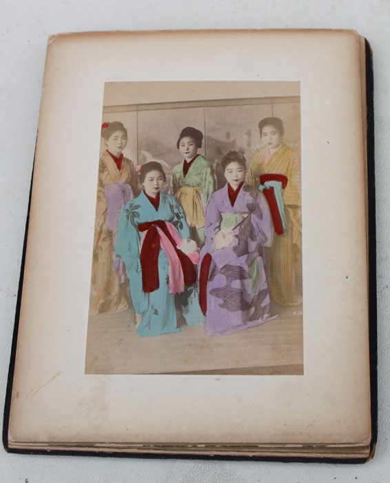 A late 19th century Japanese photograph album with fold-out pages containing twenty four colour - Image 3 of 4