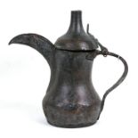 A large Turkish / Islamic copper dallah coffee pot, 31cms (12.25ins) high.