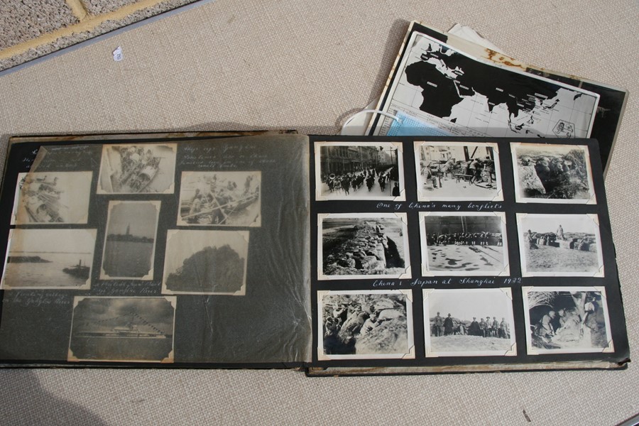 A 1930's black lacquer photograph album containing Japanese and Chinese black and white - Image 14 of 27