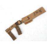 An 08 Pattern bayonet frog with helve strap and carrier. Marked to the reverse of the frog with