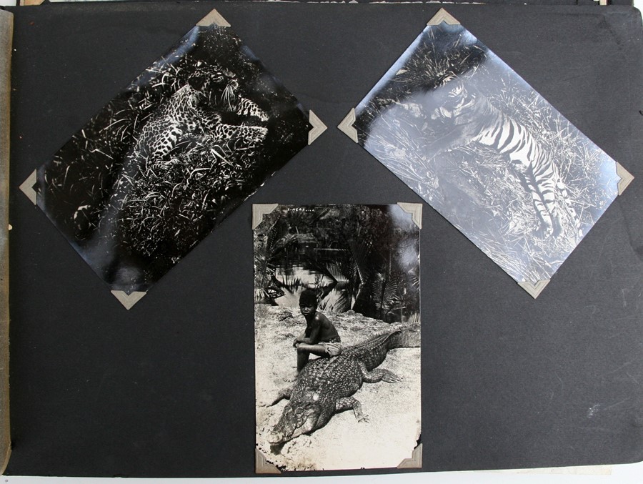 A 1930's black lacquer photograph album containing Japanese and Chinese black and white - Image 4 of 27