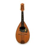 An Italian inlaid mandolin, 63cmc (24.75ins) long.