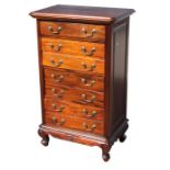 A mahogany chest of seven long drawers, 66cms (26ins) wide.Condition ReportTop has some surface