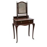 A mahogany dressing table with attached toilet mirror above a single frieze drawer, on long cabriole