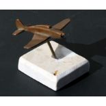 A small bronze WW2 fighter aircraft mounted on a marble base. Wingspan 7.5cms (3ins)