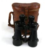 A pair of military x 7 Bino prism no. 5 Mk5 binoculars, cased.