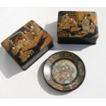 A pair of late 19th century chinoiserie boxes decorated figures on a black ground, 18cms (7ins)