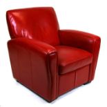 A modern Art Deco style red leather armchair.