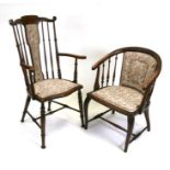 An Edwardian stained beech armchair with spindle back and upholstered seat; together with a