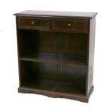 A hardwood open bookcase with brass inlay and two frieze drawers, 76cms (30ins) wide.